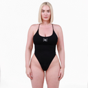 Woman wearing a black swimsuit on a white background