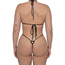 Model wearing Black Infatuation micro triangle bikini top with heart detail, back view
