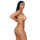 Model wearing Peach Infatuation micro thong bikini bottom, side view
