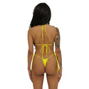 woman wearing Bright Yellow tie-side bikini, back view on a white background, 