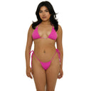 Woman wearing a fuchsia pink bikini on a white background front view