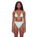 woman in mint green bikini front facing against a white wall 