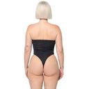 Model wearing Black Snatched tie-front one piece swimsuit, back view

