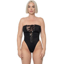 Model wearing Black Snatched tie-front one piece swimsuit, front view
